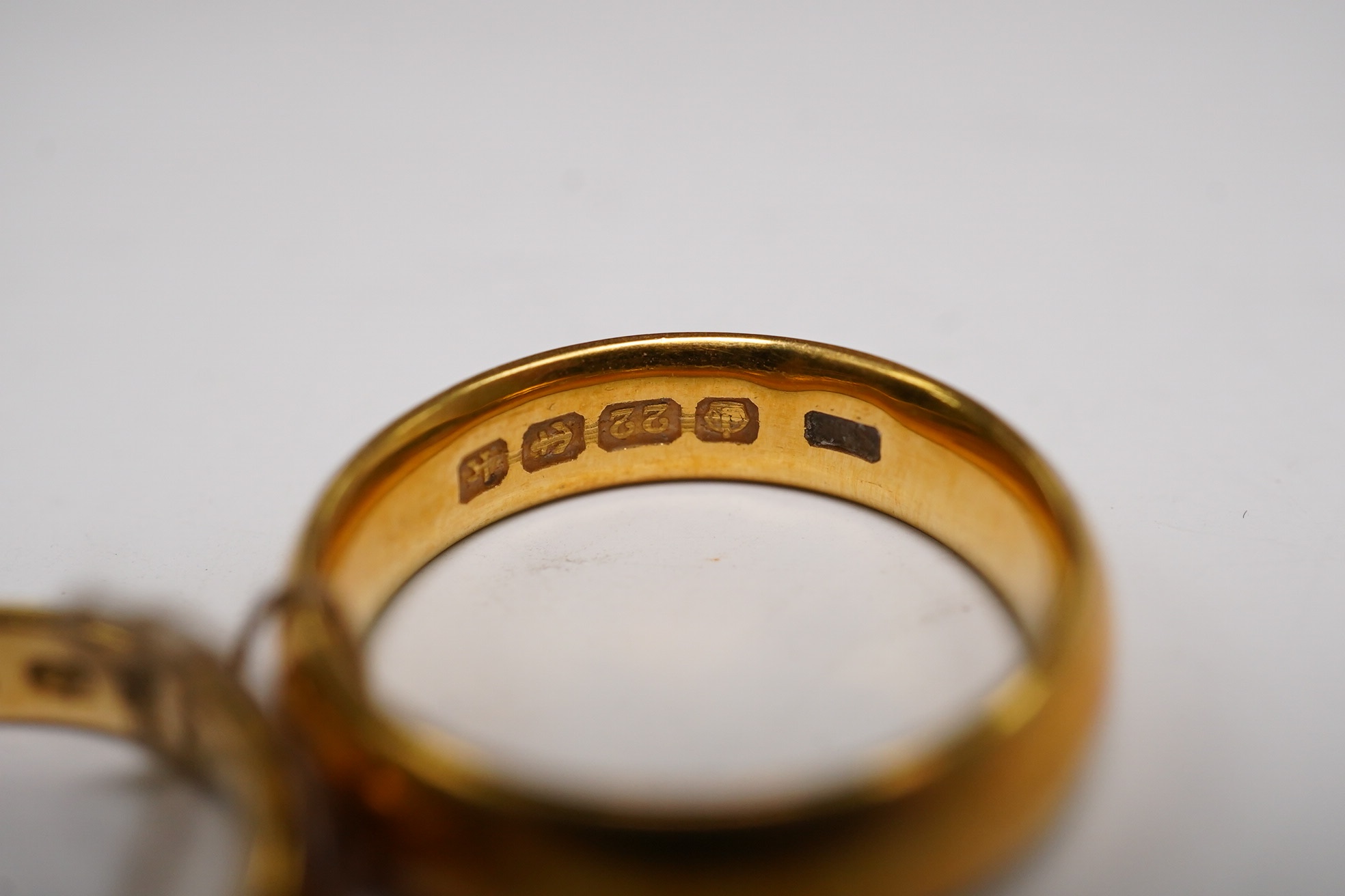 Two 22ct gold wedding bands, K/L & L, 10.3 grams. Condition - fair